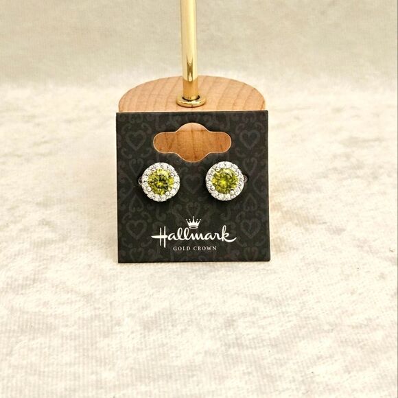 Hallmark stud earrings in Peridot color and stainless steel. - Picture 1 of 3